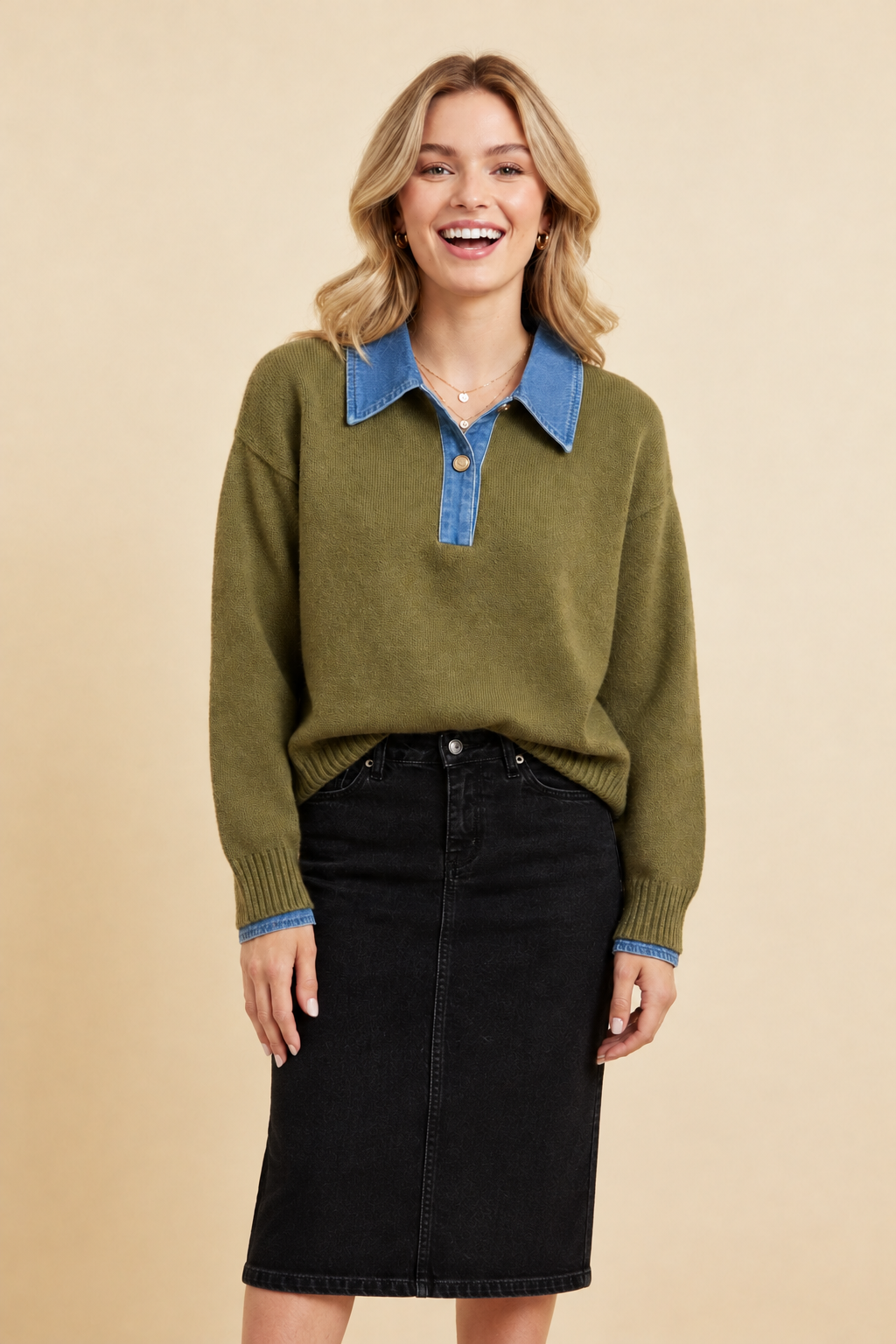 Model in olive denim-collar sweater with longer black denim midi skirt