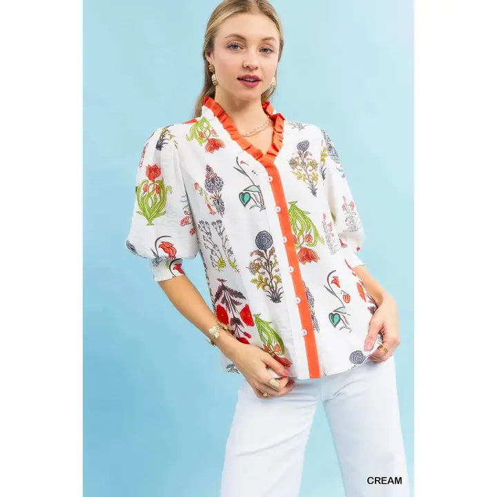 orange ruffle cream top