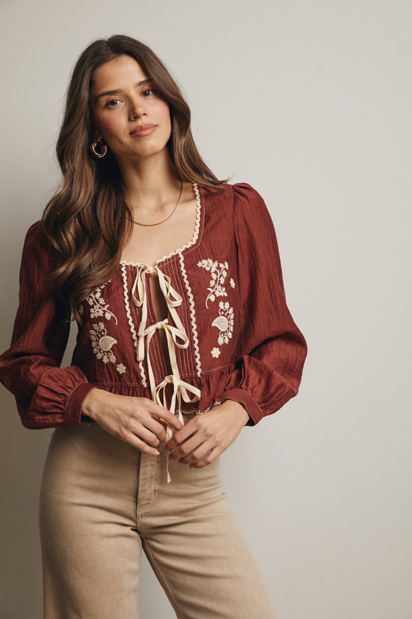 Embroidered Tie-front Peplum Blouse