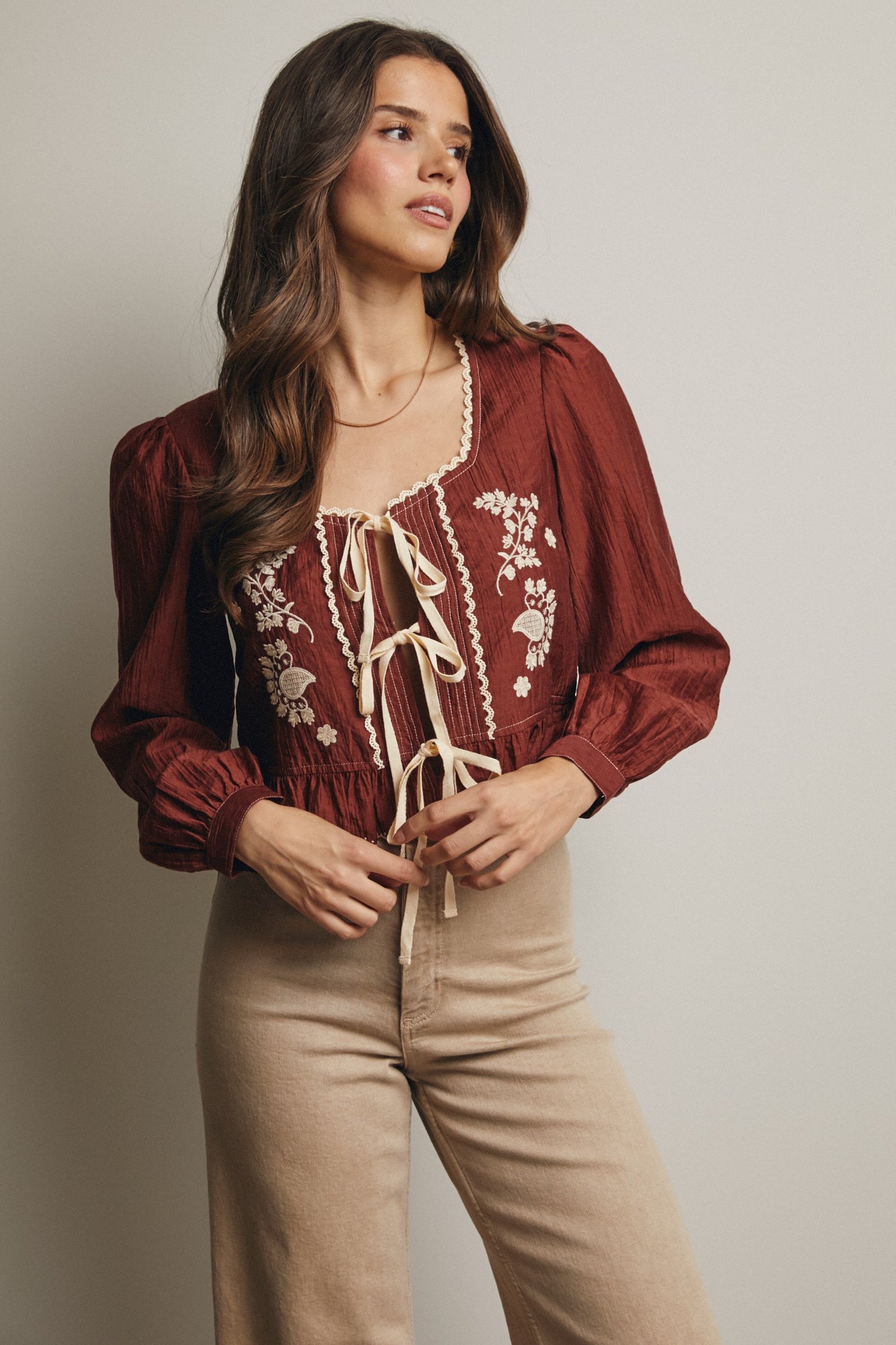 Embroidered Tie-front Peplum Blouse
