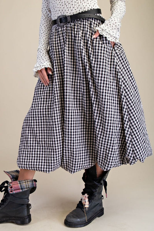 black and white checkered bubble skirt with beige