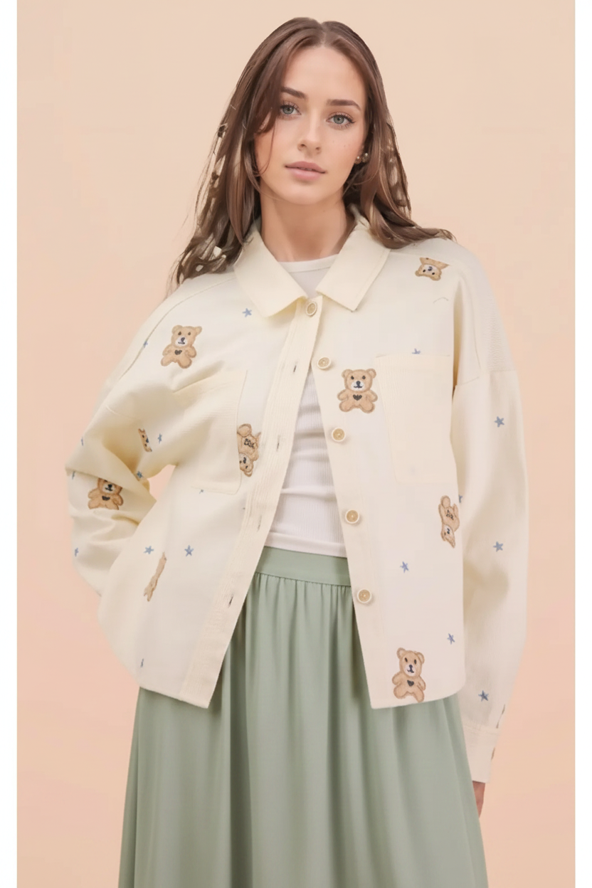 Cream teddy-bear jacket styled with a sage midi skirt