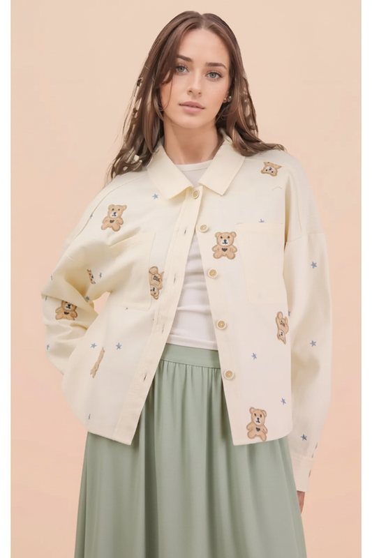 Cream teddy-bear jacket styled with a sage midi skirt