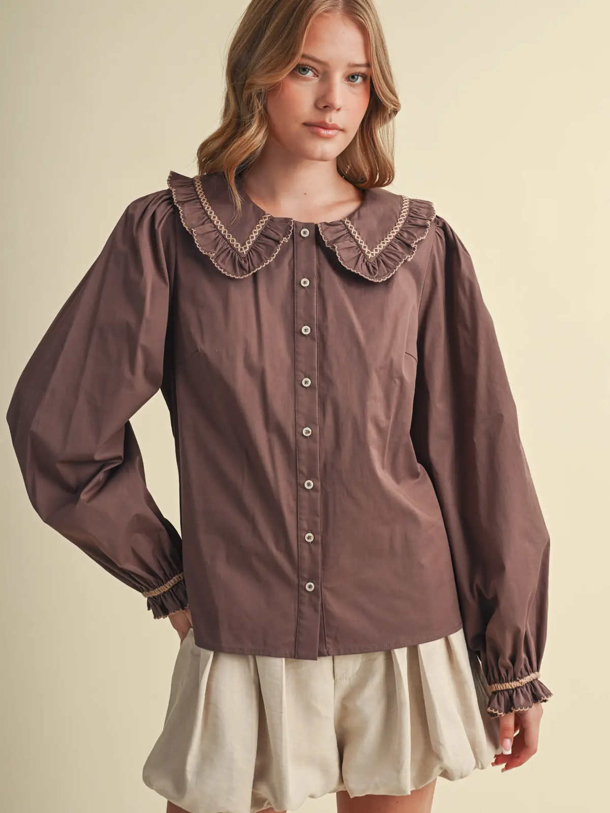 Mocha brown blouse with oversized ruffled Peter Pan collar and ruffled cuffs