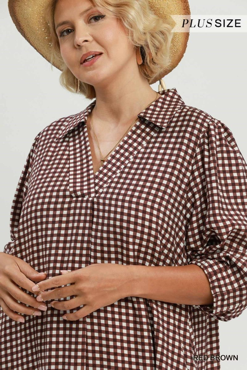 Close-up of the red-brown gingham midi shirt dress collar and V-neckline, shown in plus size red brown