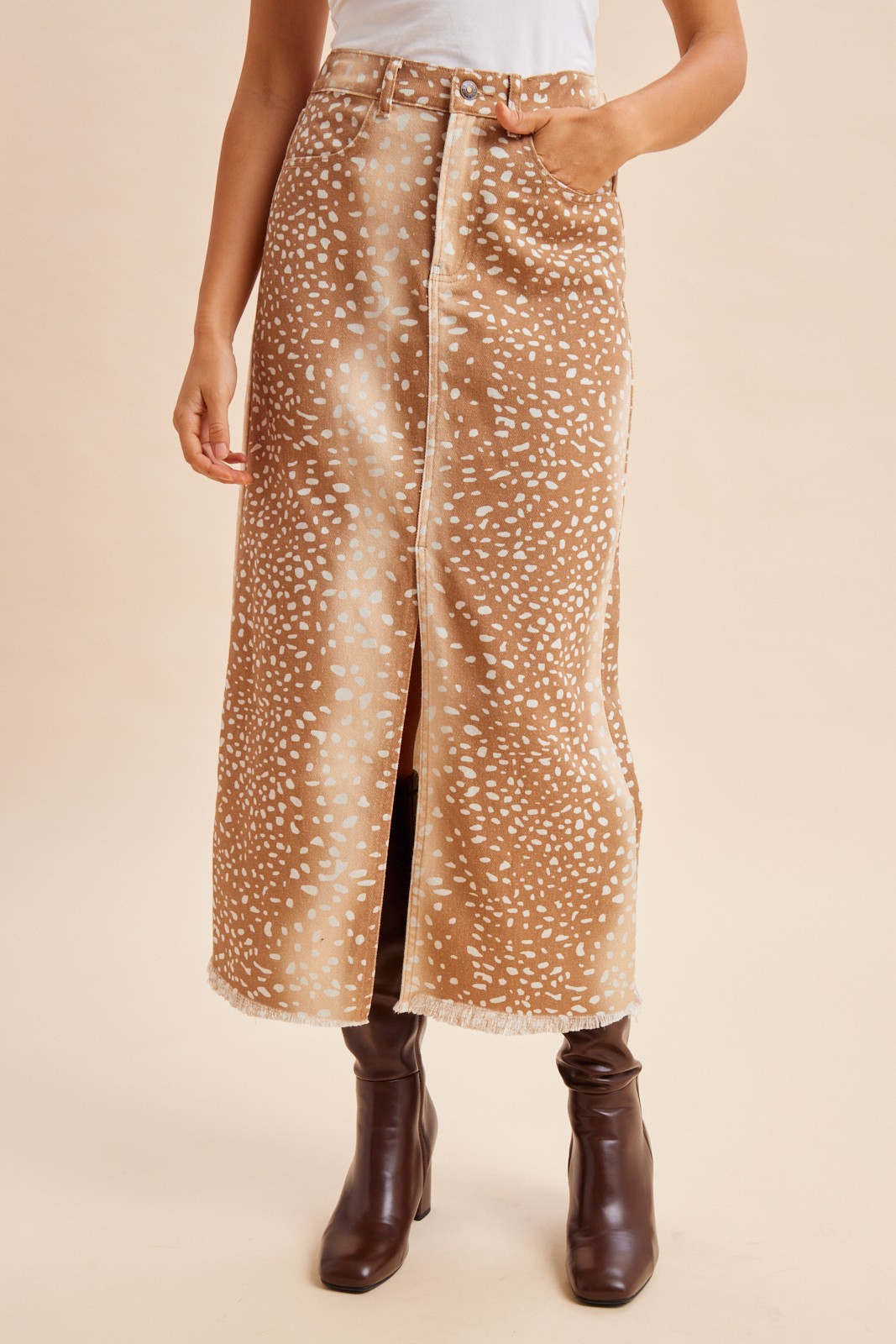 Spotted animal print denim maxi skirt with front slit and frayed hem