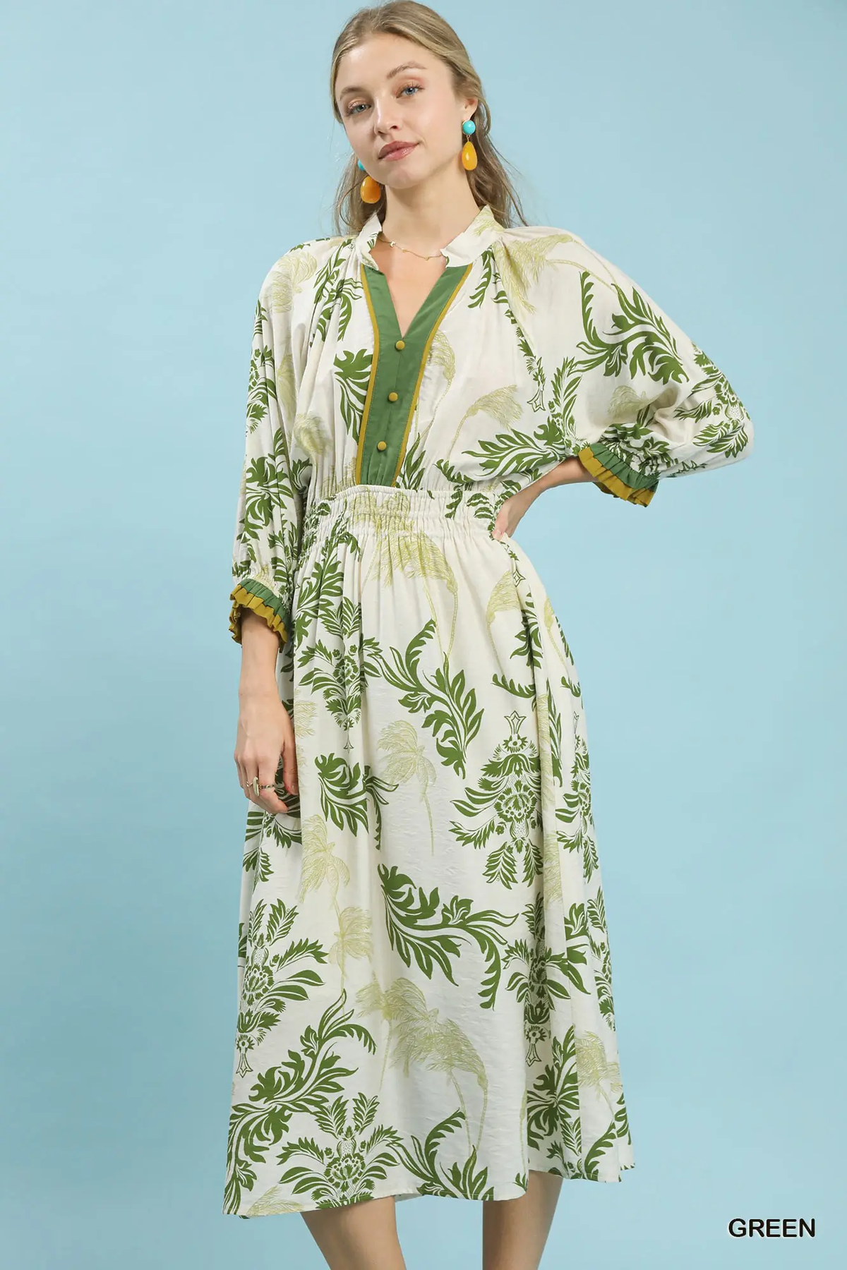 Green botanical print midi dress with green button placket and gathered waist