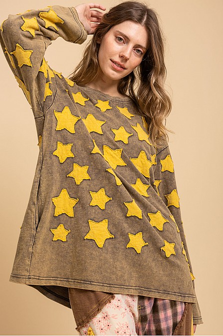 Washed brown long-sleeve tunic top with golden-yellow star patches, a round neckline, and a roomy longline silhouette.