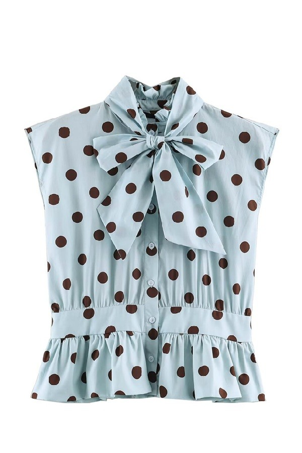 Sky blue polka dot sleeveless bow-tie blouse with ruffled peplum hem