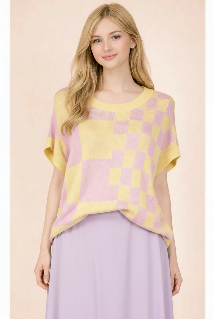 Pastel checkerboard knit top styled with a lavender skirt