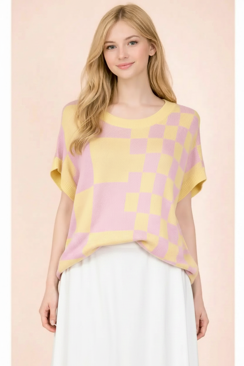 Pastel checkerboard knit top styled with a white skirt