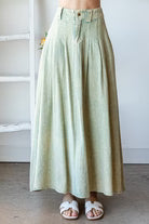 PLEATED FLARE HEM MAXI SKIRT